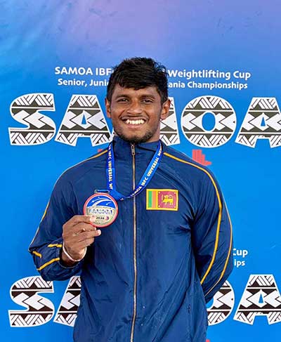 Pasindu Malawana Wins Silver Medal at Samoa IBFC Universal Weightlifting Cup 2026.