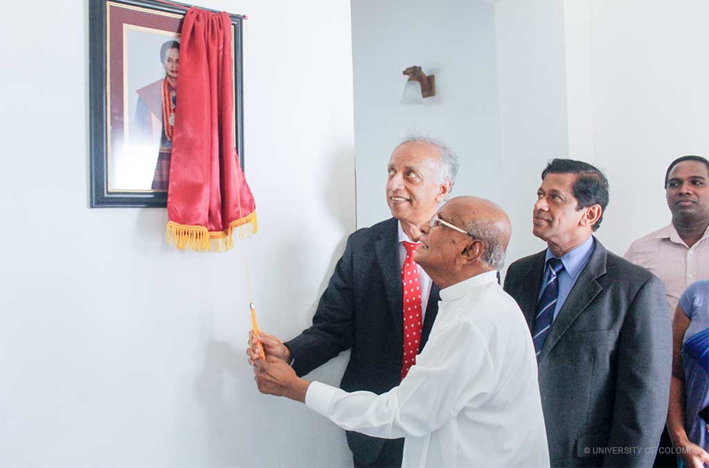 Unveiling a photograph of Dr. Siva Chinnatamby